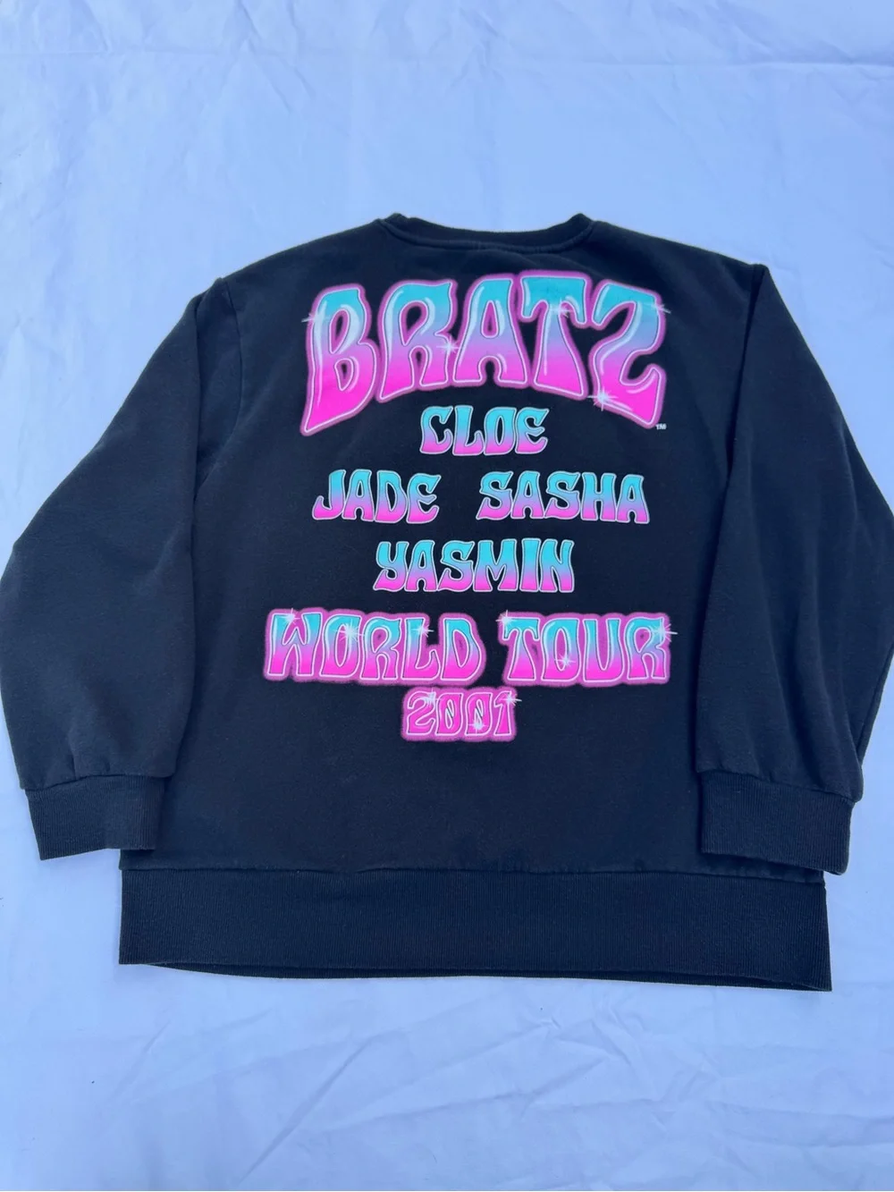 Bratz Women's Black Graphic Crewneck Sweater - Pink World Tour Design